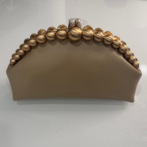 cult gaia Handbags - Cult Gaia tan Una clutch with Gold beaded handle - BRAND NEW WITH DUST BAG